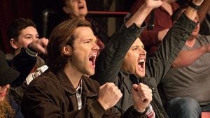 Sam and Dean enjoy a bit of wrasslin' before jumping on the case. 