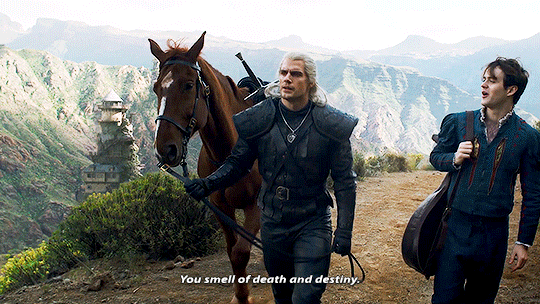 The Witcher and Jaskier walking gif